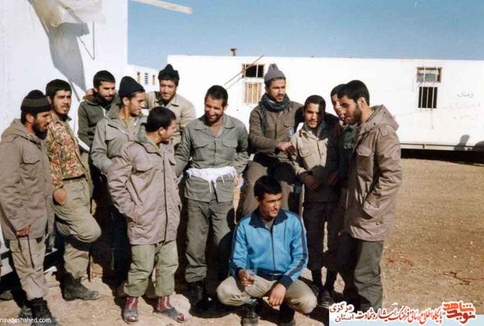 نفر نشسته: شهید محمود مرادی